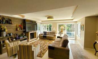 Imagem 6: Excelente residência semimobiliada com 310 m² de área construída, terreno 995,50 m² locali