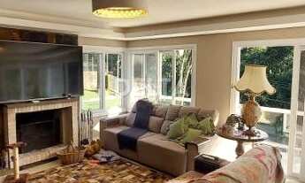 Imagem 7: Excelente residência semimobiliada com 310 m² de área construída, terreno 995,50 m² locali