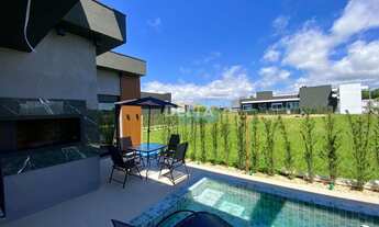 Imagem 4: Casa nova, plana, com 4 suítes, semimobiliada ,pronta para morar e condomínio com infraest