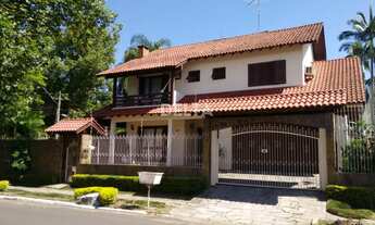 Imagem: Casa à venda com 4 quartos e 3 banheiros