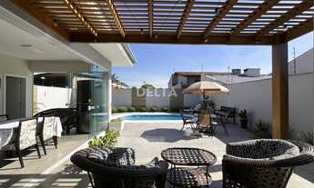 Imagem 2: Descubra o conforto e a sofisticação desta incrível casa semimobiliada a venda, localizad