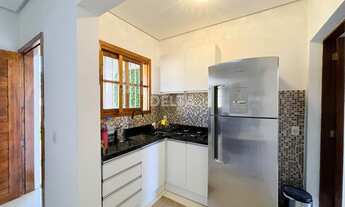 Imagem: Casa com 2 Quartos com pátio frente e fundos