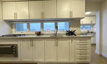 Imagem 5: Apartamento amplo, com 122m² de privativa, 03 quartos, 01 suíte, 01 vaga de garagem. Ao la