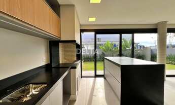 Imagem 2: Casa no condomínio SUNSET em Xangri-lá, com 4 suítes, lareira, churrasqueira e infra compl