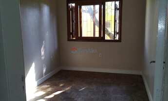 Imagem 6: Casa residencial e loja comercial na frente, separadas por um amplo terreno