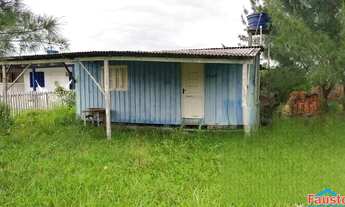 Imagem: Casa de madeira com 2 dormitórios