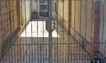 Imagem 7: Casa a meia quadra do hospital, com dois dormitórios, sala, cozinha, banheiro, área de ser