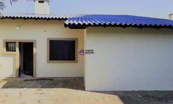 Imagem 4: Casa à venda em Curumim, Capão da Canoa - 141m² - Churrasqueira e Semimobiliado