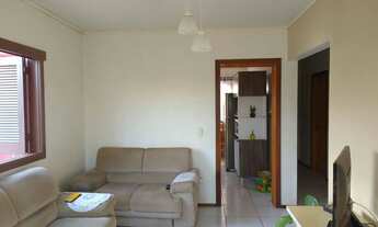 Imagem 3: Casa em alvenaria com aproximadamente 100m², com 03 dormitórios, sendo um com suíte, sala