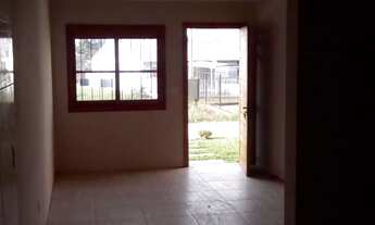 Imagem 7: Casa de alvenaria com aproximadamente 60 m2, 2 dormitórios, sala de jantas, cozinha, banhe