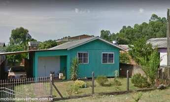 Imagem: Casa residencial de madeira, com 2 dormitórios