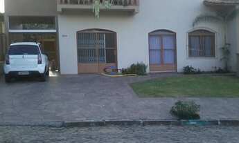 Imagem: Casa com 4 Dormitorio(s) localizado(a) no