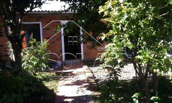 Imagem: Casa de alvenaria com 2 garagens na frente