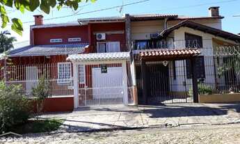 Imagem: CASA COM DOIS PISOS COM 4 DORMITÓRIOS