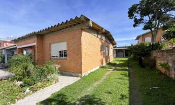 Imagem 7: Casa à venda bairro Centro em Tramandaí: Cozinha, Lareira, Churrasqueira e Pátio