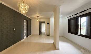 Imagem 1: Casa à venda em Imbé no bairro Centro, de laje com 3 suítes e piscina!