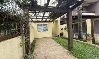 Imagem 2: Imóvel à venda em Imbé, bairro Centro, com churrasqueira e área de serviços!