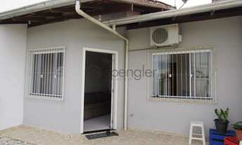 Imagem: Casa geminada no bairro Poço Grande, em