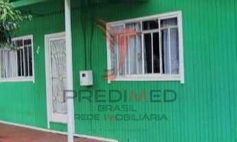 Imagem: Casa de madeira, em Lages, Bairro São Luiz,esquina