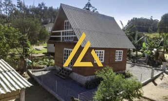 Imagem: Chalé com vista para lagoa