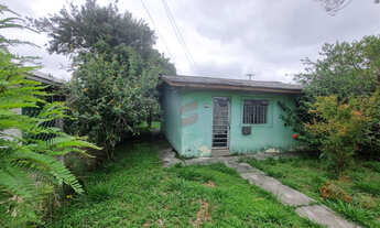 Imagem 2: P data-start=135 data-end=223>Terreno com uma casa à venda localizada na Rua Marilând