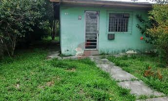 Imagem 3: P data-start=135 data-end=223>Terreno com uma casa à venda localizada na Rua Marilând