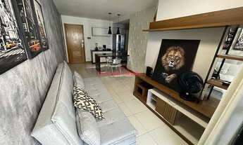 Imagem 3: Quarto e sala com vista mar