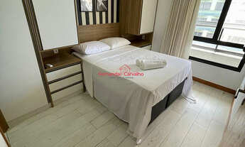 Imagem 6: Quarto e sala com vista mar