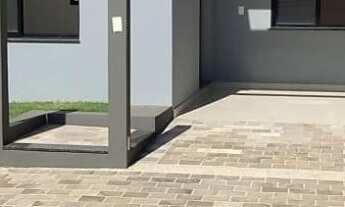 Imagem: Casa geminada de esquina com pátio à venda