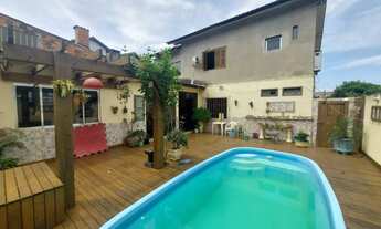 Imagem 5: EXCELENTE CASA ESTILO SOBRADO de 4 quartos, localizado em rua tranquila e residencial, no