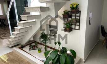 Imagem 2: Venha se encantar com este maravilhoso sobrado de 4 dormitórios em Santo André! Com uma co