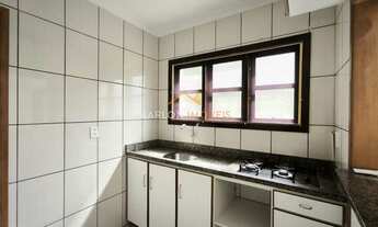 Imagem 5: Apto com 2 dormitórios, com garagem. Junto a hospital e centro. Próximo de tudo!