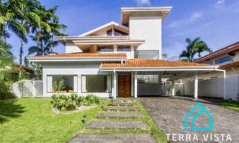 Imagem: Casa com 4 suítes, área gourmet e piscina