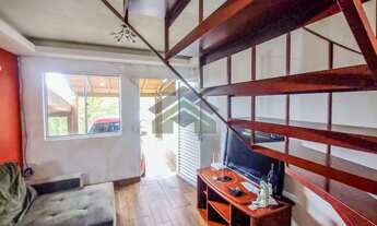 Imagem 3: Sobrado ampliado com vaga coberta