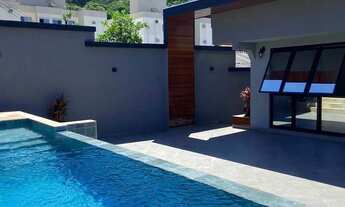 Imagem 5: Casa nova de alto padrão com 4 suítes e 3 vagas de garagem em Itajaí/SC