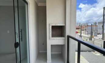 Imagem 4: Geminado com 3 dormitórios sendo 1 suíte, sacada com churrasqueira e 1 vaga em Barra Velha