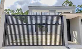 Imagem 5: Sobrado com 3 suítes sendo 1 master e 2 vagas de garagem em Camboriú/SC