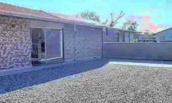 Imagem: Casa com piscina tendo 2 dormitórios e