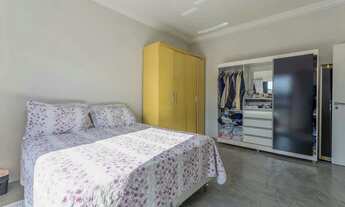 Imagem: Casa com 3 suítes e 2 vagas de garagem