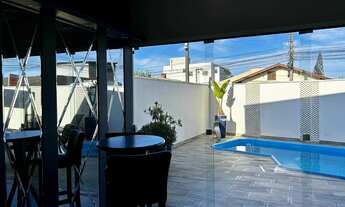 Imagem 3: Casa com 3 dormitórios sendo 1 suíte e 2 vagas de garagem no Centro de Navegantes/SC