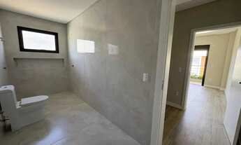 Imagem 7: Casa de alto padrão com 4 dormitórios sendo 3 suítes e 4 vagas de garagem em Camboriú/SC