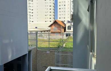 Imagem 2: Apartamento com 2 dormitórios e 1 vaga de garagem em Navegantes/SC