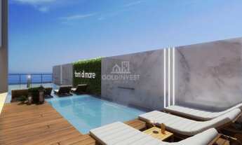 Imagem 6: ![CDATA[Apartamento com três suítes na praia de Perequê]]