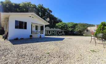 Imagem 2: ![CDATA[Terreno espetacular. Possui uma casa mista sobre ele.]]