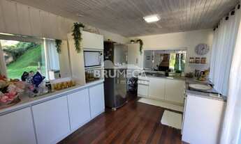 Imagem 6: ![CDATA[Terreno espetacular. Possui uma casa mista sobre ele.]]