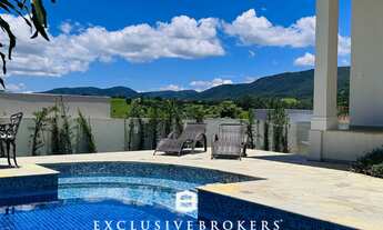 Imagem: 4 suíte, 5 banheiro, 2 vagas na garagem