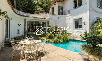 Imagem: Casa com 5 quartos (3 suítes) e piscina