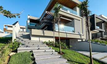 Imagem: 5 dormitórios, 5 suíte, 6 banheiro, 4