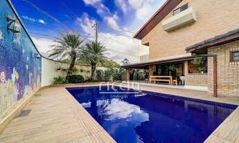 Imagem: 4 dormitórios, 4 suíte, 6 banheiro, 4