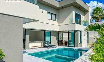 Imagem: 4 dormitórios, 4 suíte, 6 banheiro, 4